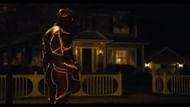An unidentified speedster outside Barry Allen's childhood home (Image via WB/ DC)